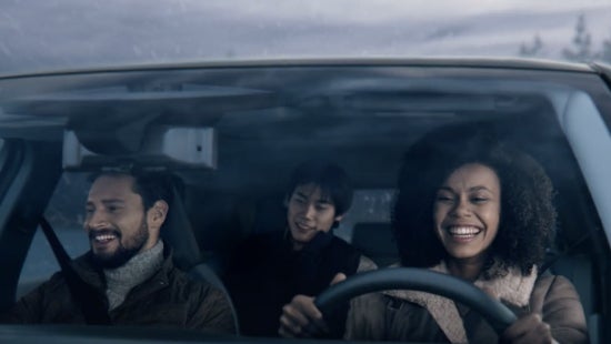 Three passengers riding in a vehicle and smiling | Matt Blatt Nissan in Egg Harbor Township NJ
